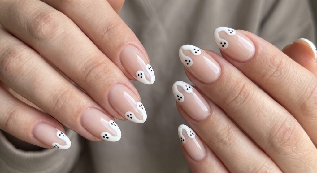 Micro ghost french tips minimalist Halloween nail design on nude base