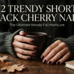 12 trendy short black cherry nails holding a coffee cup fall manicure aesthetic